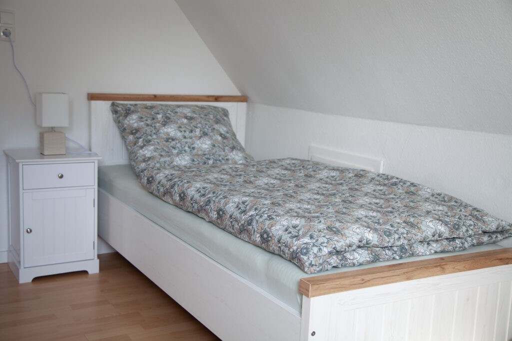 Einzelbetten - Ferienwohnung Augustfehn