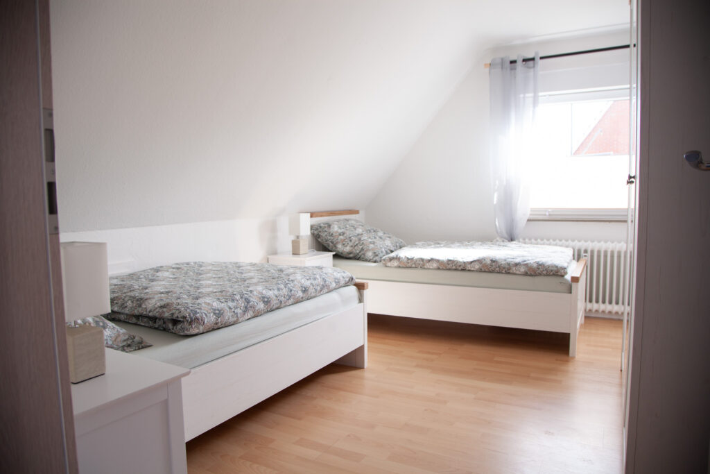 Einzelbetten - Ferienwohnung Augustfehn